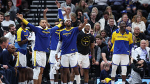 a group of men in blue and yellow jerseys